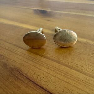 Krementz patented marked gold tone oval cuff links